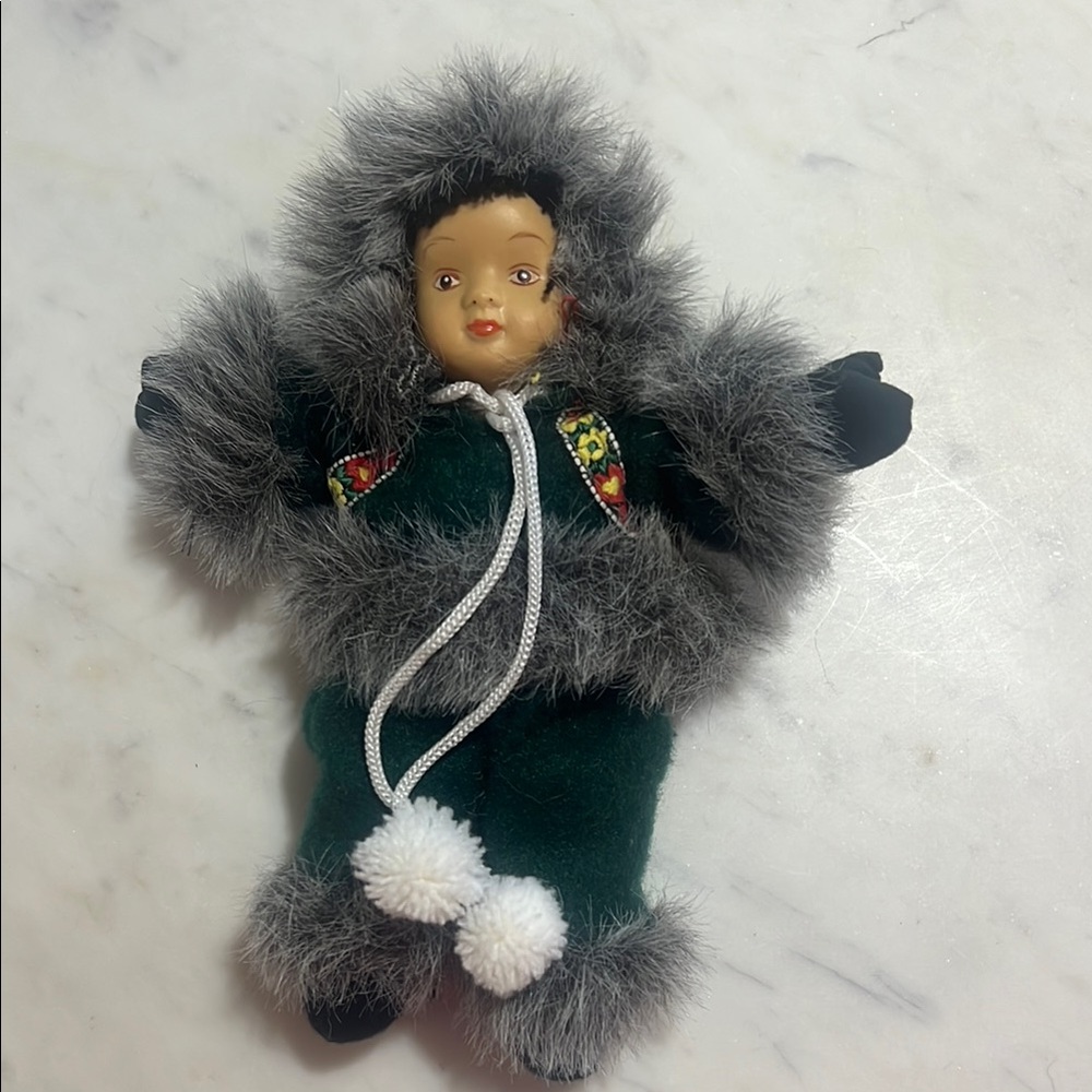 Adorable Doll in Green and Gray Fur Outfit